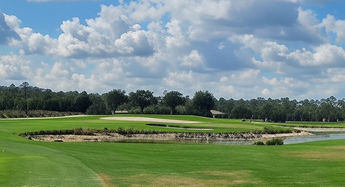Hideout Golf Club in Naples Florida fairway view via Grok