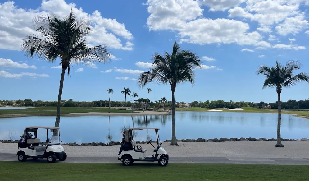 Lely Resort Golf & Country Club in Naples Florida water view with golf carts via Grok