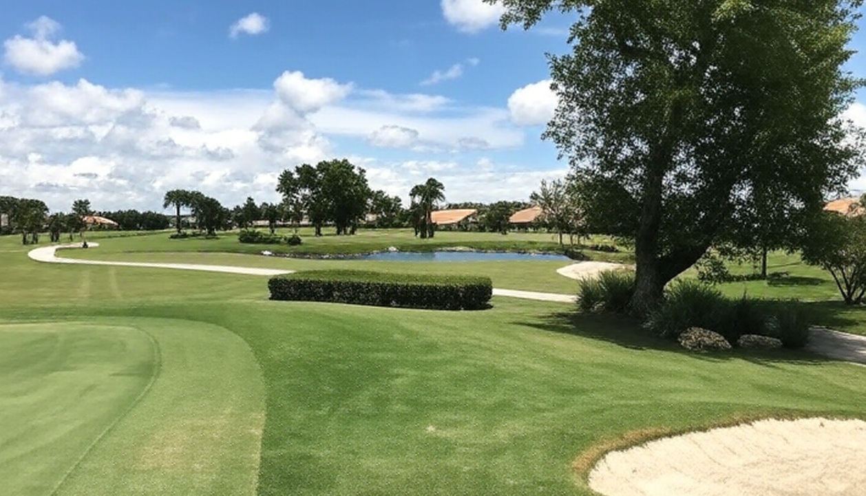 Quail Village Golf Club in Naples FL cart path and bunker view via Grok