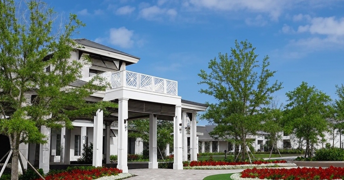 Club Pelican Bay in Naples FL clubhouse view via Grok