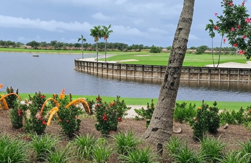 Heritage Bay Golf & Country Club in Naples FL island green view via Grok
