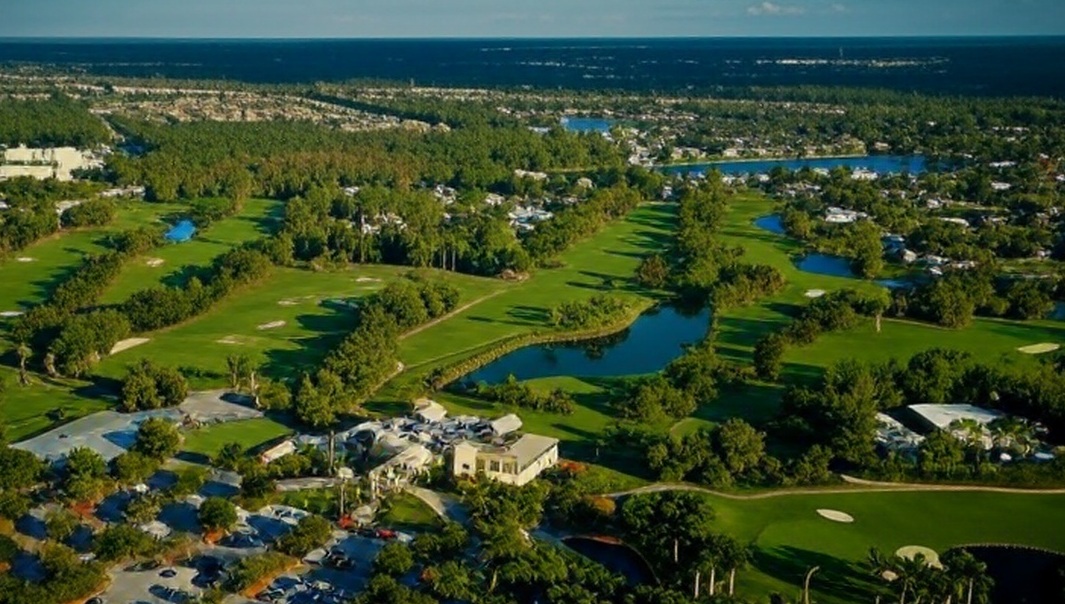 Imperial Golf Club in Naples Florida arial view of development and golf course via Grok