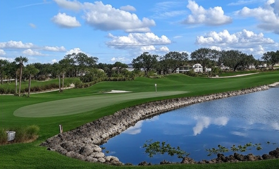Kensington Golf & Country Club in Naples Florida view of green with surrounding water via Grok