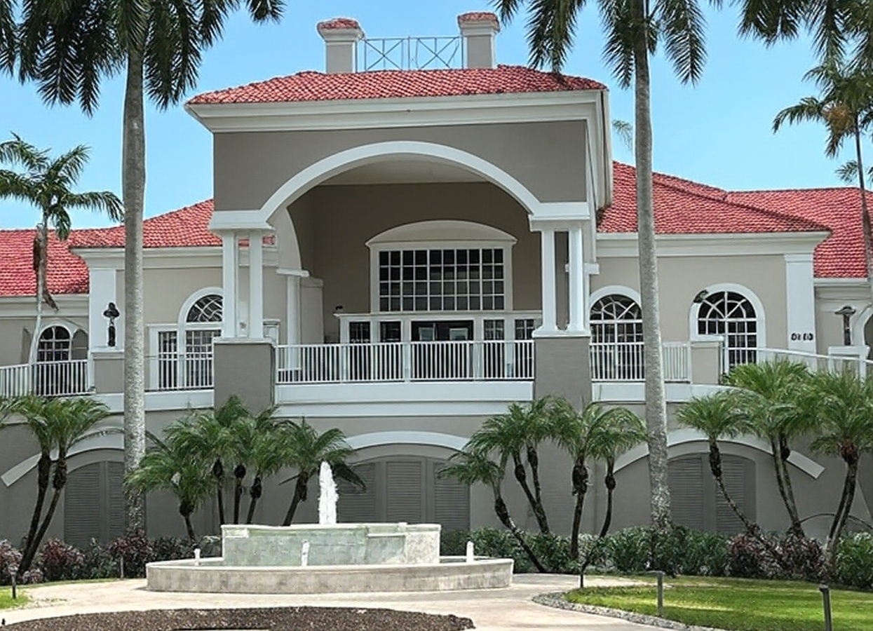 Naples Lakes Country Club in FL clubhouse view via Grok
