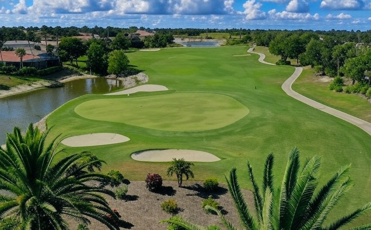 Palmira Golf Club in Bonita Springs Florida arial view of green and bunkers via Grok