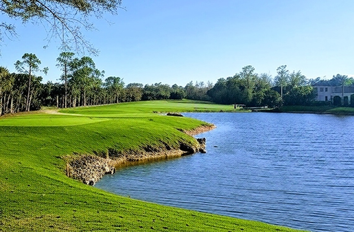 Quail West Golf & Country Club in Naples Florida water and fairway view via Grok