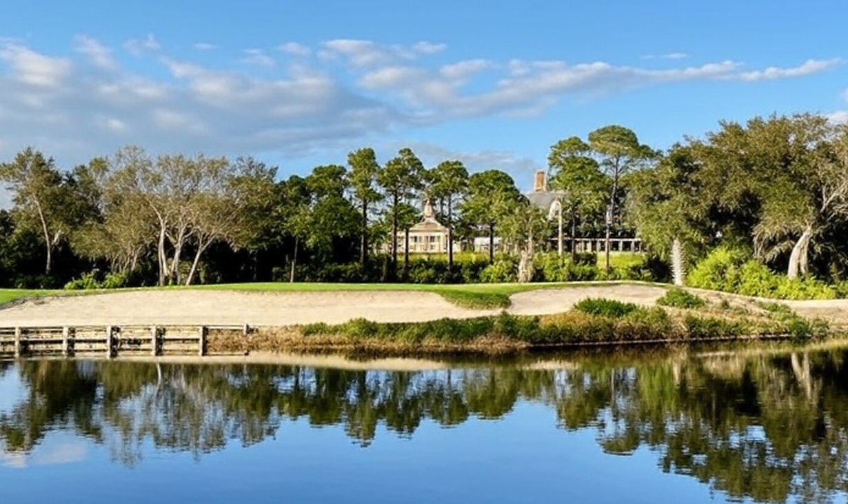 The Old Collier Golf Club in Naples Florida green with bunker and water in front via Grok