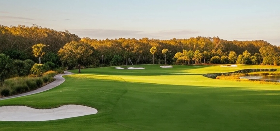 The TwinEagles Club in Naples Florida fairway view with bunkers via Grok