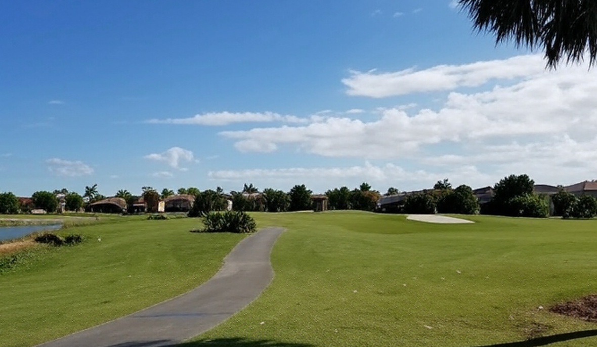 Valencia Golf & Country Club in Naples Florida fairway with bunkers view via Grok