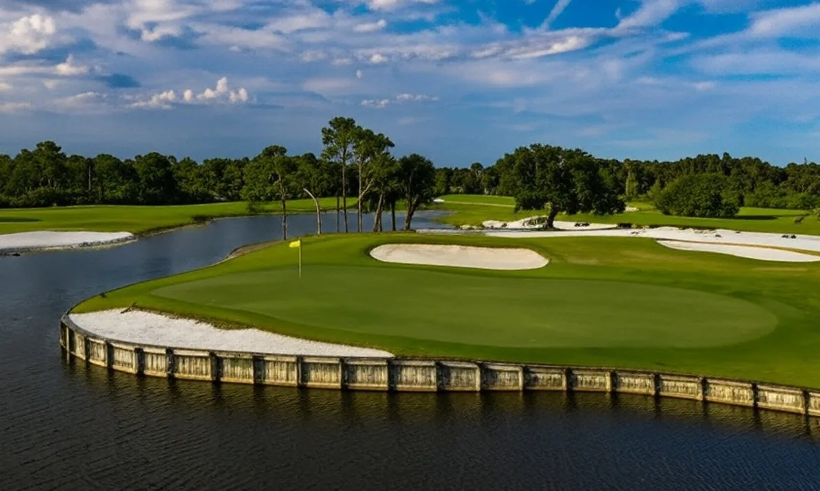 Hobe Sound Golf Club in Florida view of green surrounded by water and sand traps via Grok