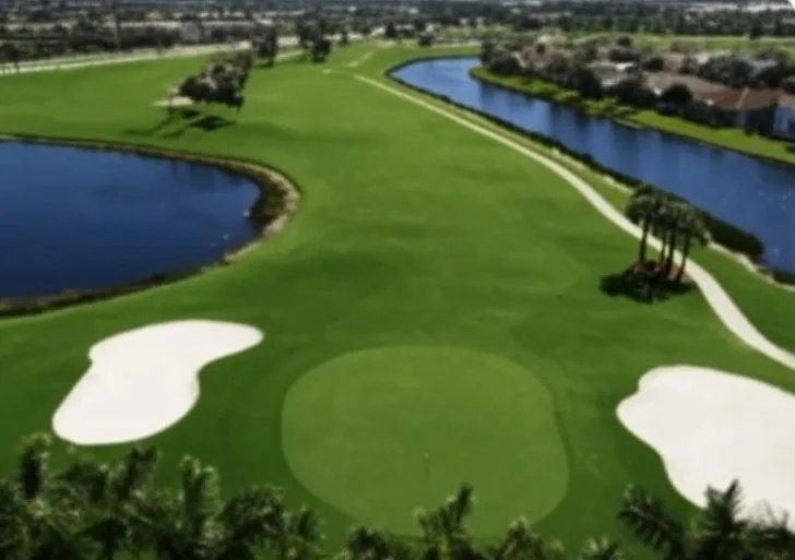 Westchester Country Club in Boynton Beach Florida arial view of fairway with bunkers and water via Grok